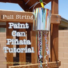 Pull String Paint Can Pinata from OneCreativeMommy.com {Perfect for little ones at an art-themed party. Every kid gets to "break" the piñata at the same time.} utorial