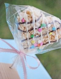 Quick and Easy Frosted Rice Krispie Treats in 30 Minutes or Less! You won't believe how easy it is to make this frosting with one ingredient and no special tools! {OneCreativeMommy.com}