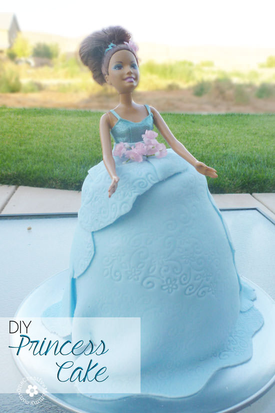 DIY Princess Cake Tutorial -- Use a blond barbie, and you've got an Elsa Frozen Cake! {Tutorial from OneCreativeMommy.com} 