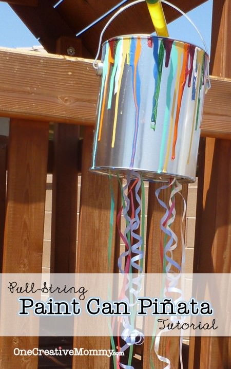 Pull String Paint Can Pinata from OneCreativeMommy.com {Perfect for little ones at an art-themed party.  Every kid gets to "break" the piñata at the same time.} 