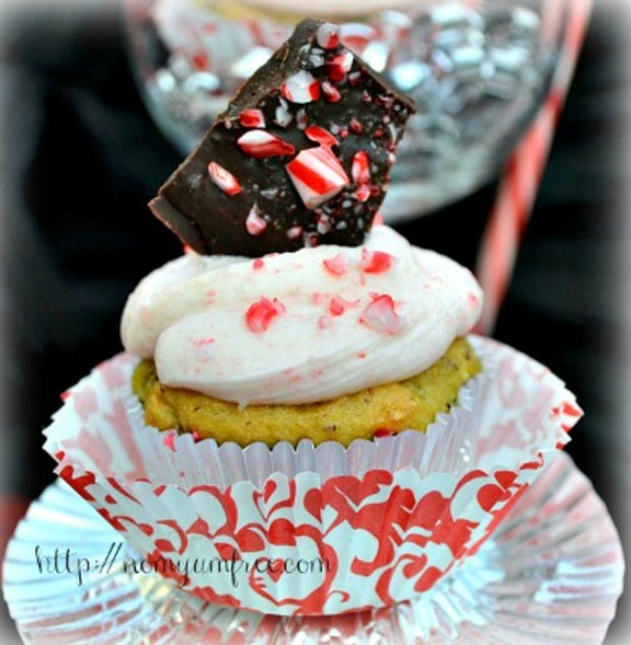 Delicious gluten free peppermint ganache cupcakes with peppermint bark topping. Yum! {OneCreativeMommy.com} #peppermint #glutenfree #christmas