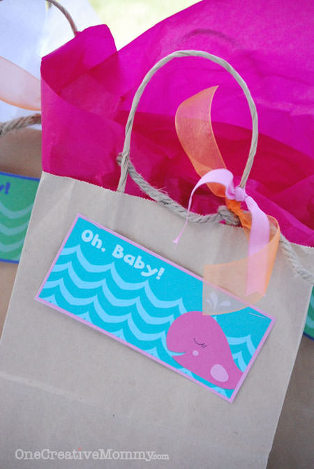 Easy Gift Bags from Recycled Materials--Forgot to get a gift bag?  Check out these easy tips for making your own, and download free bag toppers from OneCreativeMommy.com.