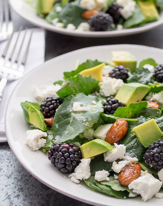 Baby Kale and Blackberry Salad with Ricotta Salata, Avocado and Rosemary Honeyed Almonds from Taste Love & Nourish {20 Main Dish Salads Perfect for Summer on OneCreativeMommy.com}