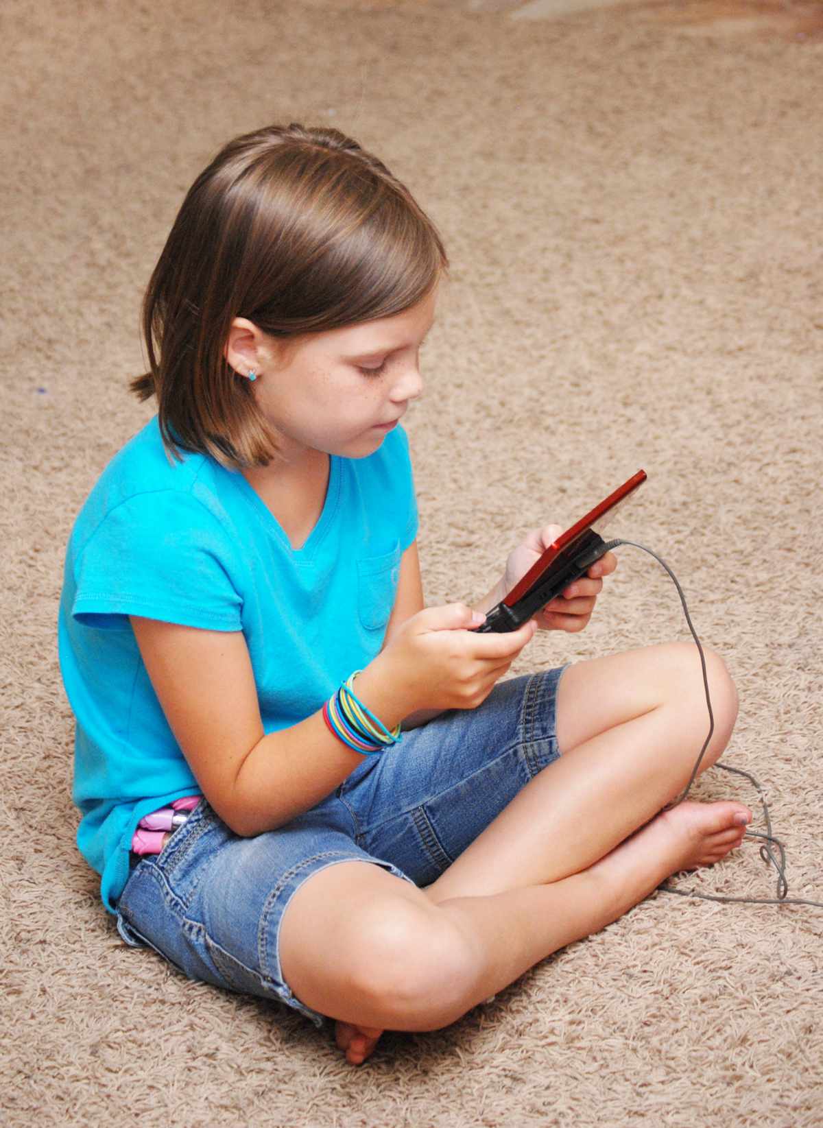 Setting screen time limits for kids with simple technology rules for families