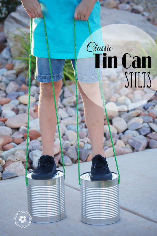 Just in time for summer, recycle tin cans into a classic toy -- Tin Can Stilts! {OneCreativeMommy.com} I remember playing with these when I was a kid!