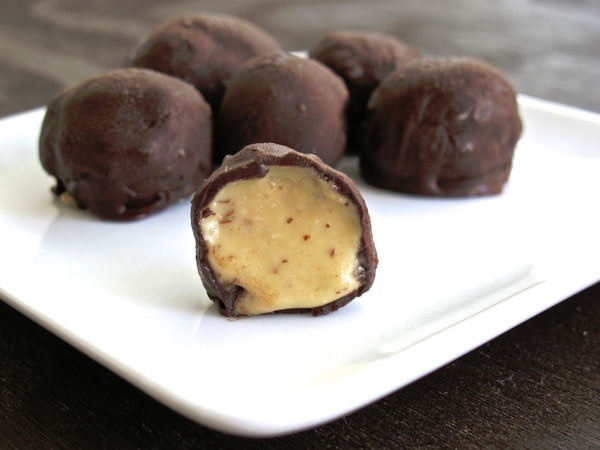 Healthy Chocolate Peanut Butter Balls from Tasting Page {25 Thanksgiving Dessert Recipes from OneCreativeMommy.com}