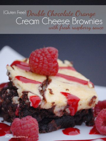 Delicious Double Chocolate Orange Cream Cheese Brownies with Fresh Raspberry Sauce -- You won't believe this amazing dessert is gluten free! {Start with a prepared mix to make these super easy!} OneCreativeMommy.com #Sponsored