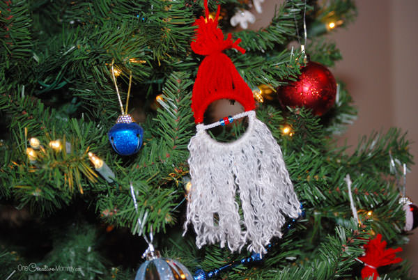 Homemade Christmas Ornaments for Kids {Easy Santa Claus Ornament} Kids love this easy Christmas craft! OneCreativeMommy.com