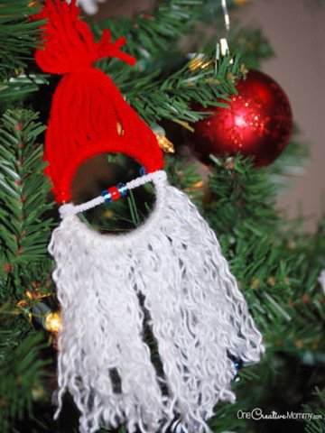 Homemade Christmas Ornaments for Kids {Easy Santa Claus Ornament} Kids love this easy Christmas craft! OneCreativeMommy.com