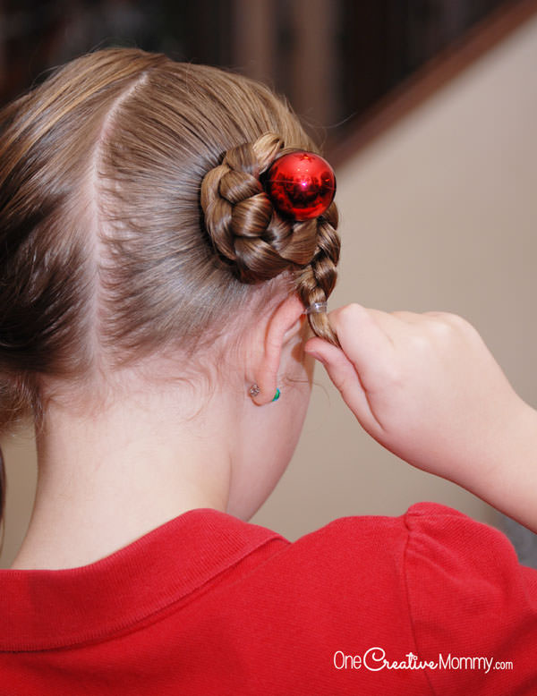Whip up this quick and easy holiday hair in just a few minutes!  {Perfect for school and Christmas parties!} Cute girls' hairstyle from OneCreativeMommy.com