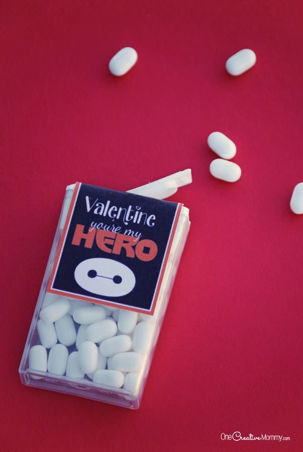 Disney fans are going to love these Big Hero 6 Valentines! Just for fun, use a sharpie to add a face to a tic tac on the box, and you've got a mini Baymax! {Free Printable from OneCreativeMommy.com}