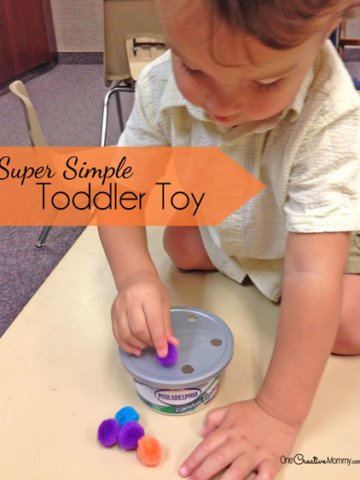 Kids have fun and stay busy while developing fine motor skills with this simple to make toddler toy (OneCreativeMommy.com}
