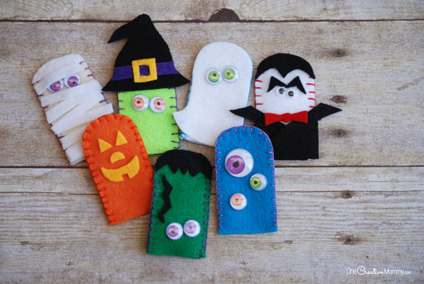 Fun Felt Halloween Finger Puppets! A cool craft to make with your kids. {OneCreativeMommy.com} Free template and lots of pictures and ideas