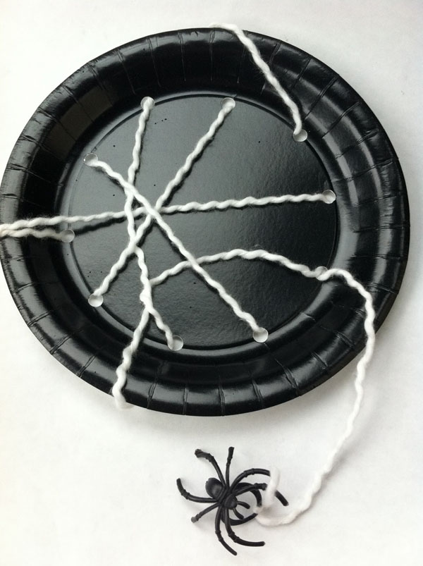 Paper Plate Spiderwebs from Jinxy Kids {Featured on OneCreativeMommy.com | Fantastic Halloween Class Party Ideas}