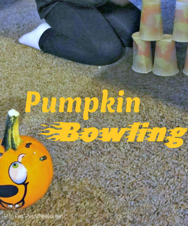 Pumpkin Bowling Game from P is for Preschooler {Featured on OneCreativeMommy.com | Fantastic Halloween Class Party Ideas}