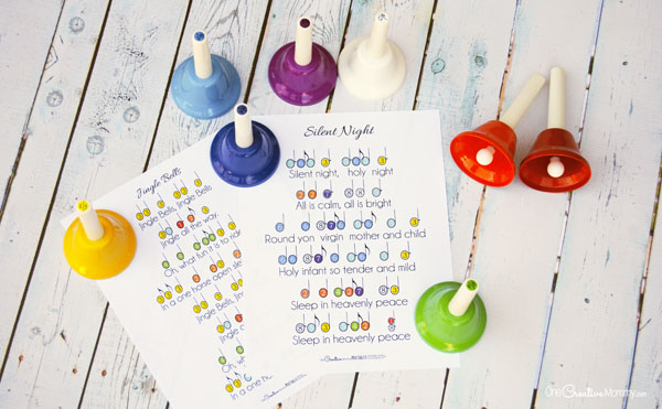 Our newest Christmas tradition--Christmas handbells! Download printable music for 5 popular carols to start your own family tradition today. {OneCreativeMommy.com}