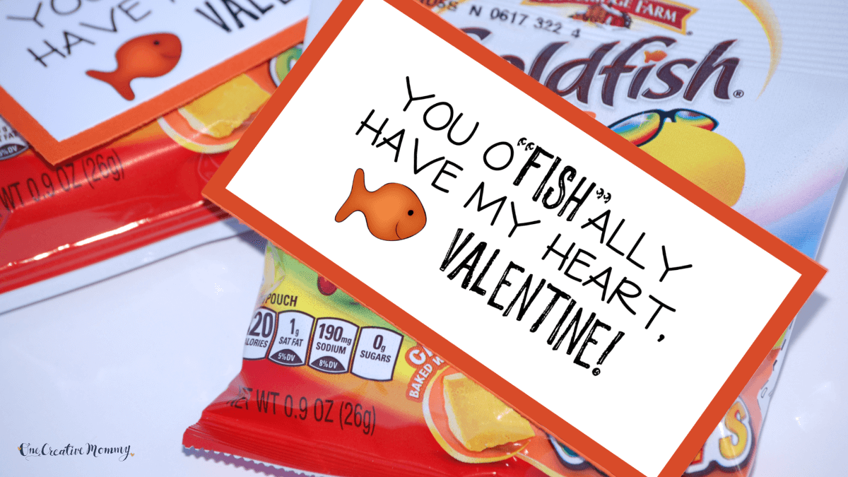 A small bag of Goldfish crackers is shown with a card on top that says, You o-fish-ally have my heart, Valentine. The card has a picture of a goldfish cracker on it.