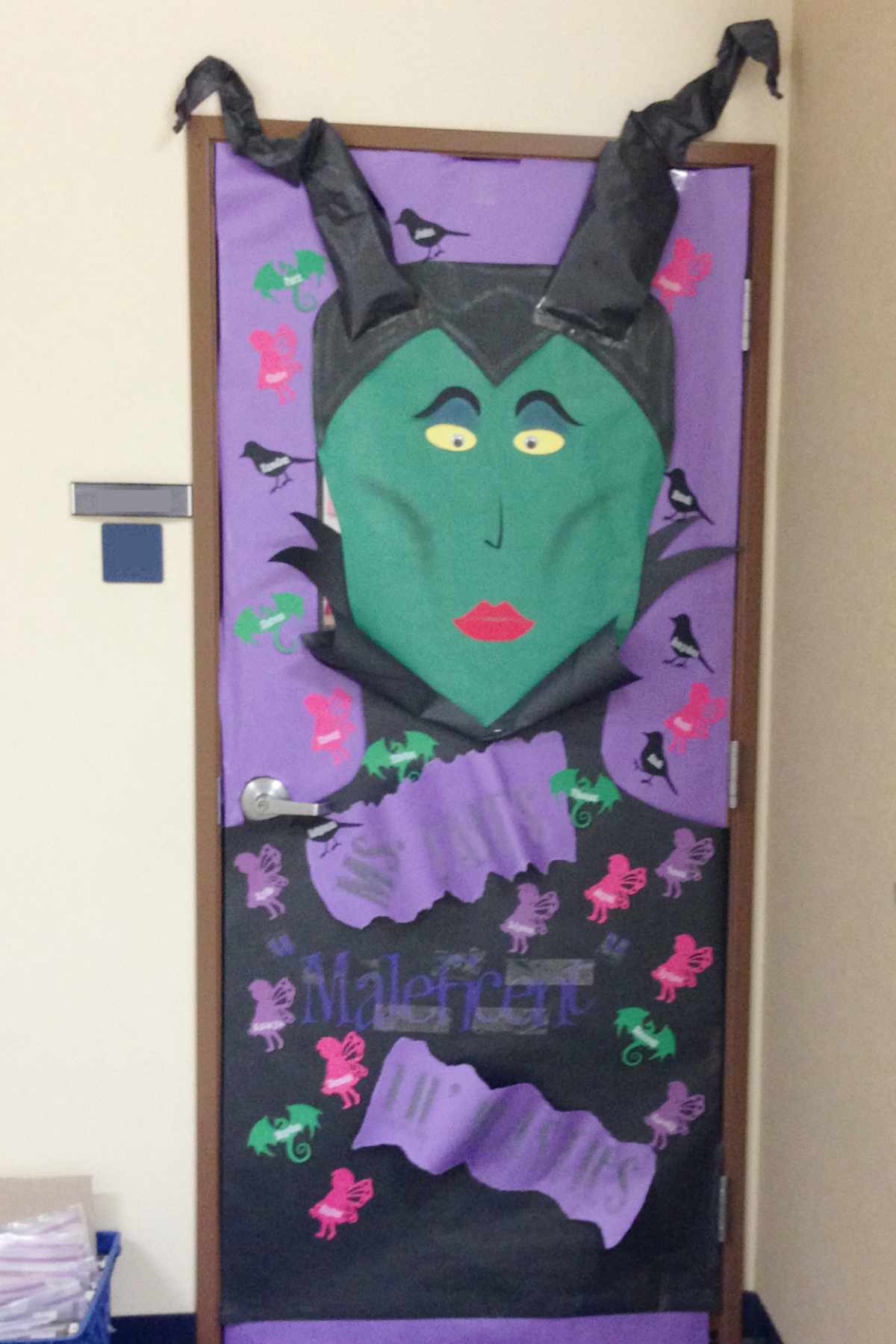 Maleficent-inspired Halloween classroom door decoration with black horns
